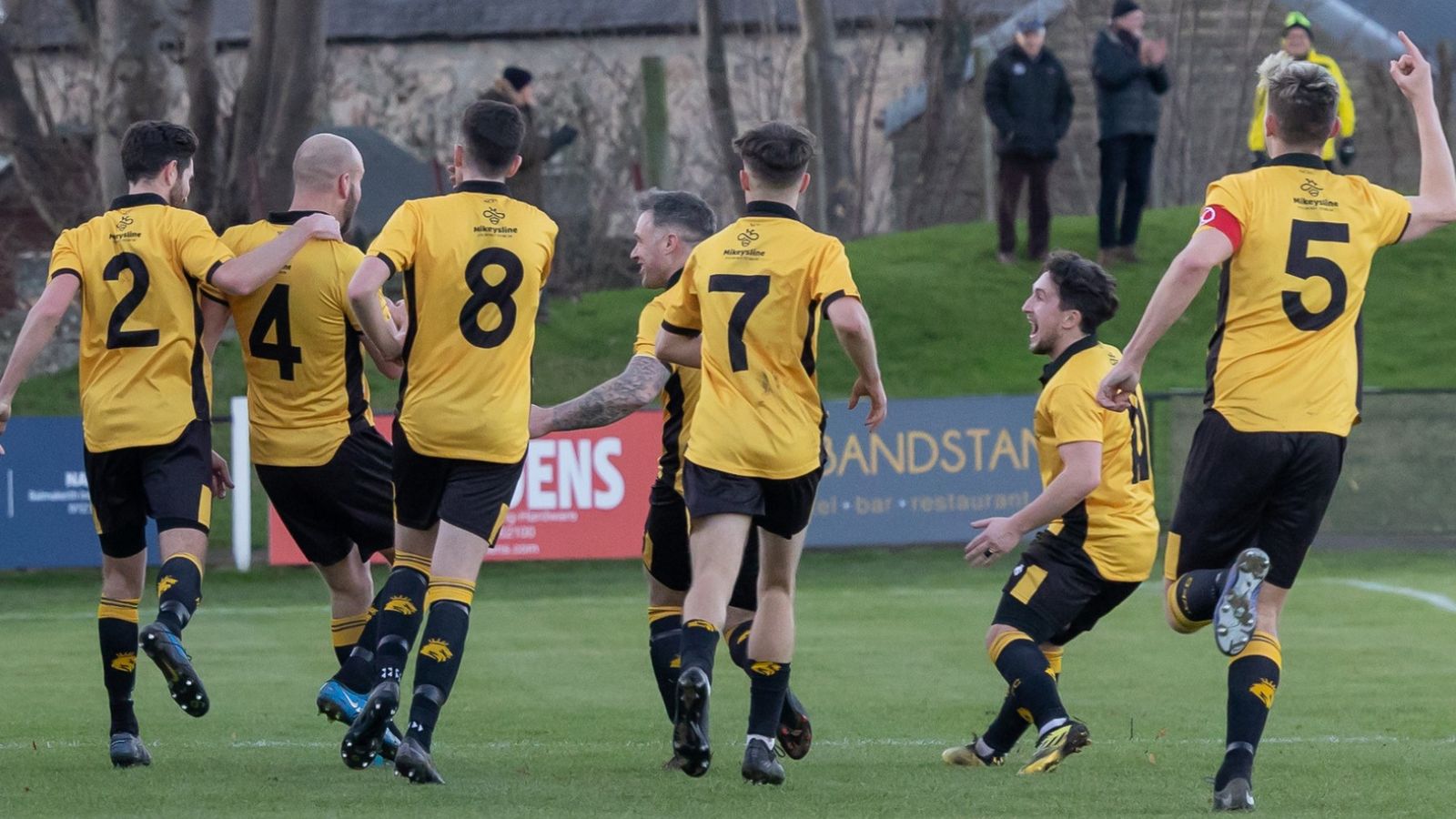 Ross Tokely celebrates his wonder goal for Nairn County with his team mates